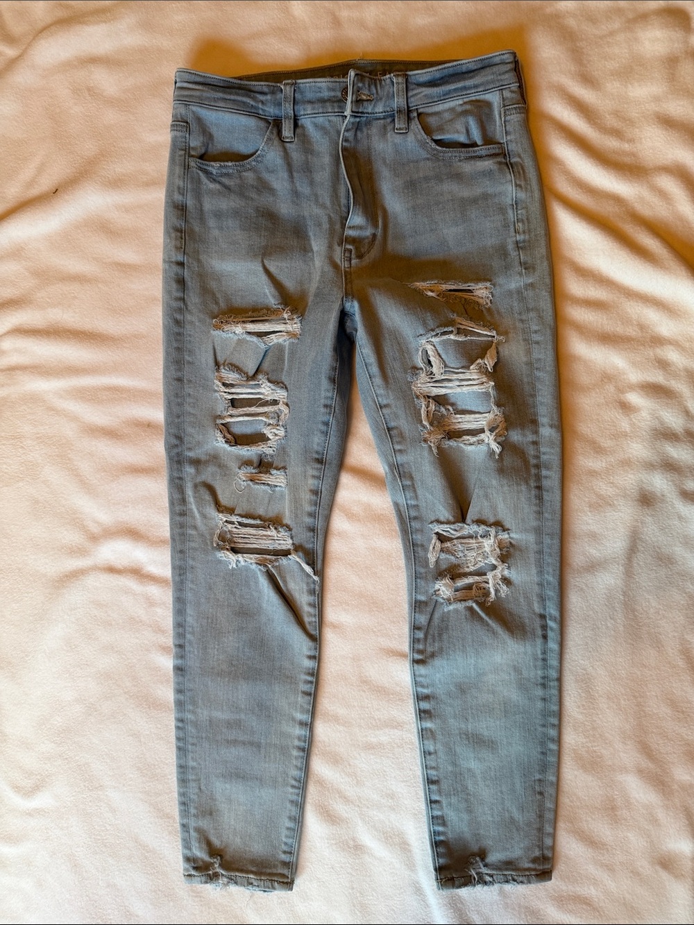 American Eagle  super high rise, jegging crop Light Blue Ripped Skinny Jeans